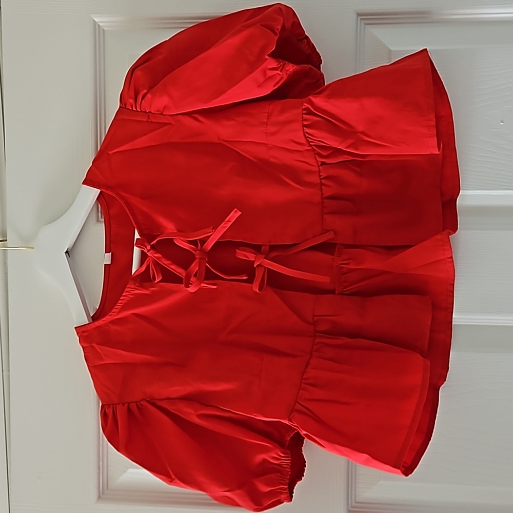 Blouse with bows and puffed sleeves